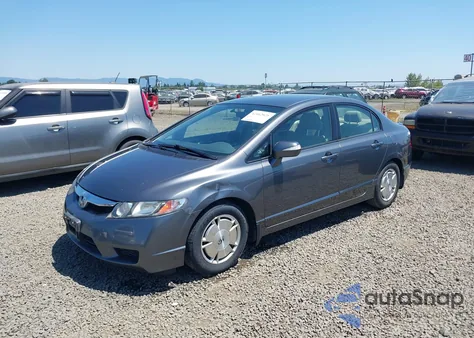 2010 Honda Civic Hybrid из США, поврежденный, VIN JHMFA3F28AS001502